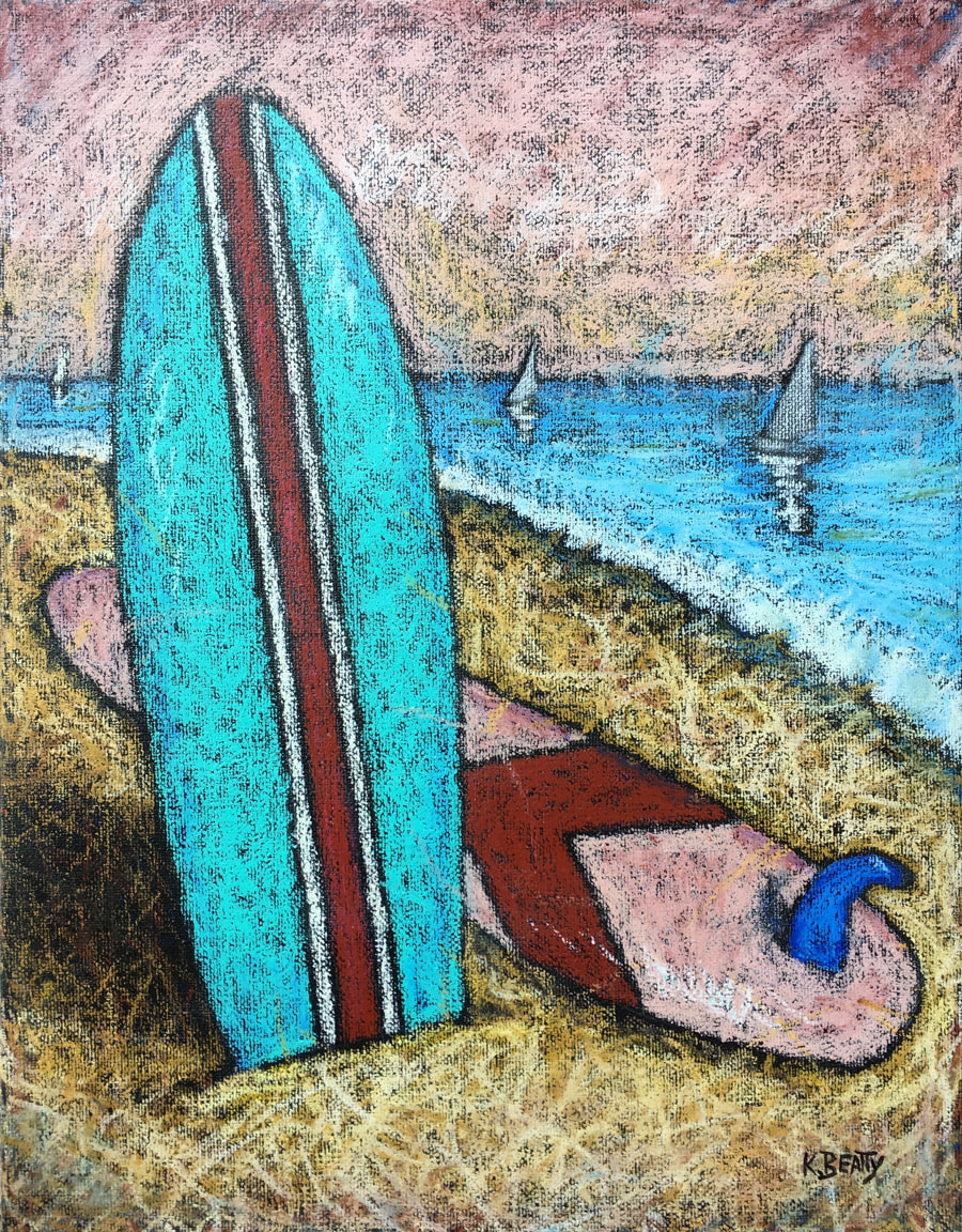 Two colorful surfboards resting on the beach with sailboats out on the water in the distance.